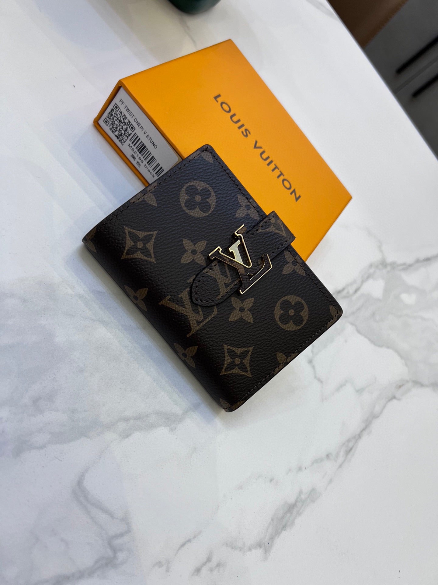 Louis Vertical CP Taurillon leather wallet size : 9*12*10 cm