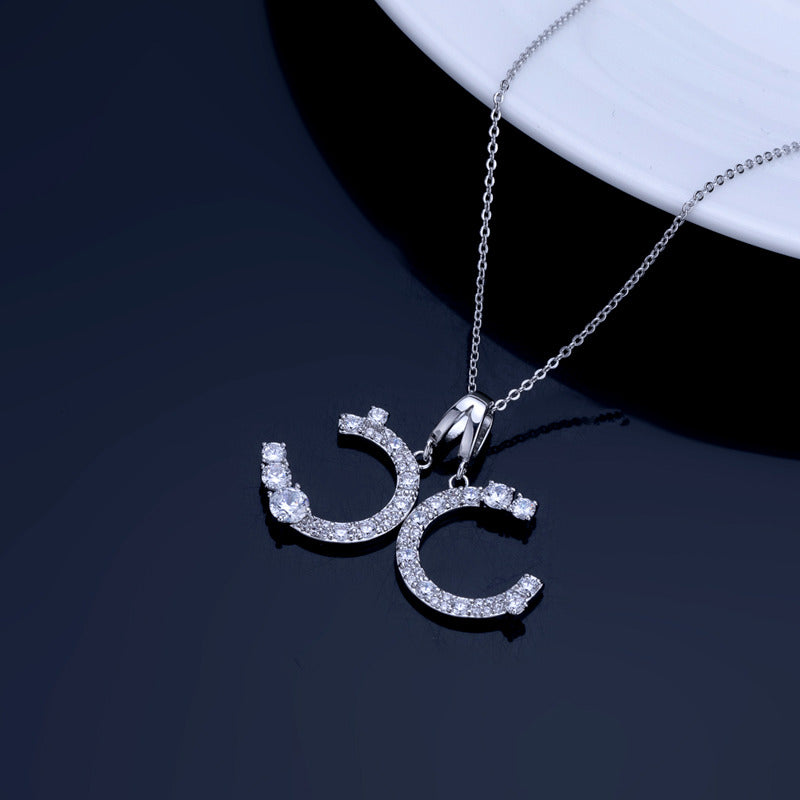 Double C necklace with diamond