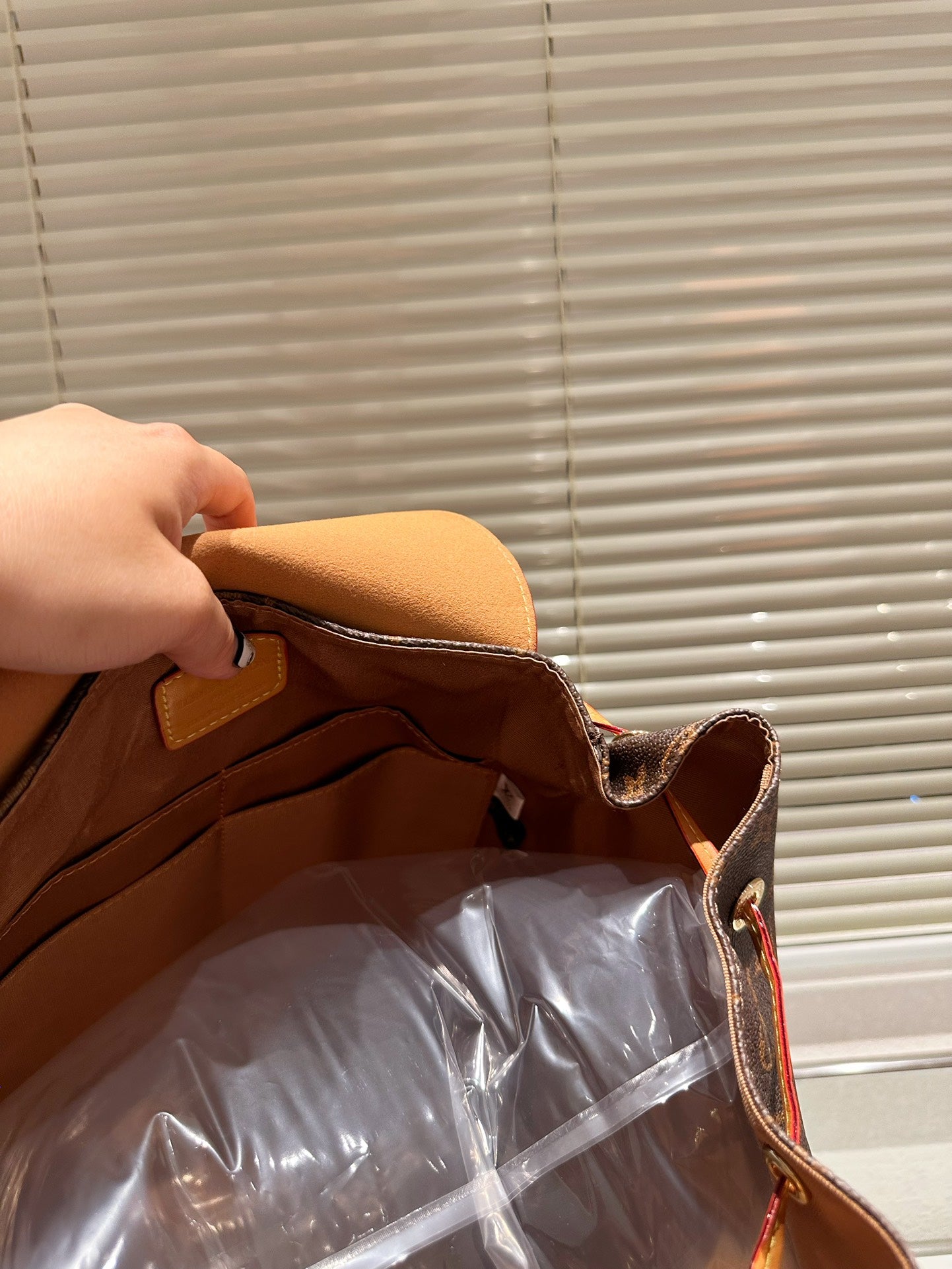 Louis Petite Malle Monogram backpack bag size : 37*45 cm