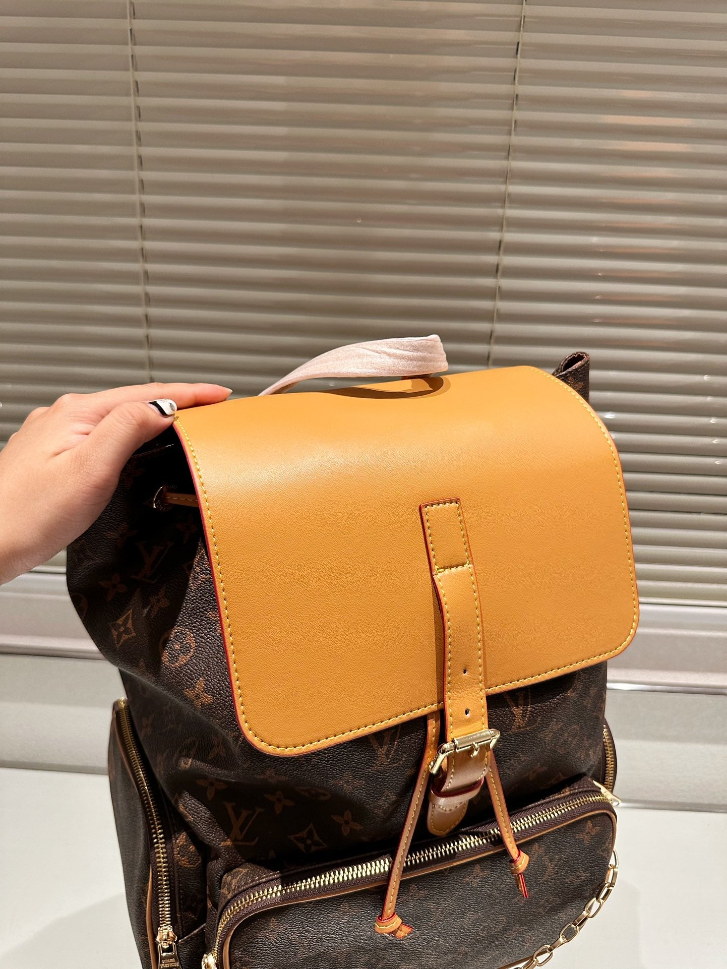 Louis Petite Malle Monogram backpack bag size : 37*45 cm