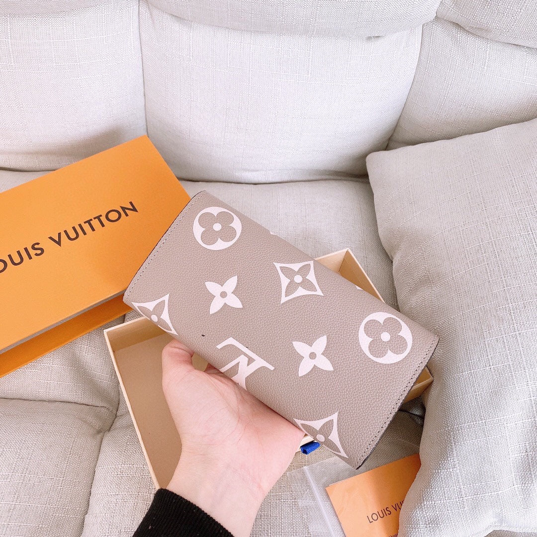 Louis Monogram Empreinte wallet size : 19.5x10.5 cm