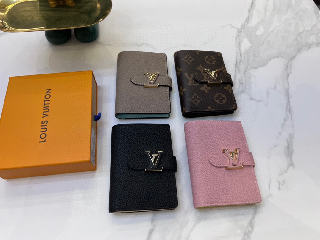 Louis Vertical CP Taurillon leather wallet size : 9*12*10 cm